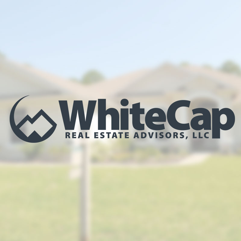 WhiteCap Real Estate Advisors - Logo